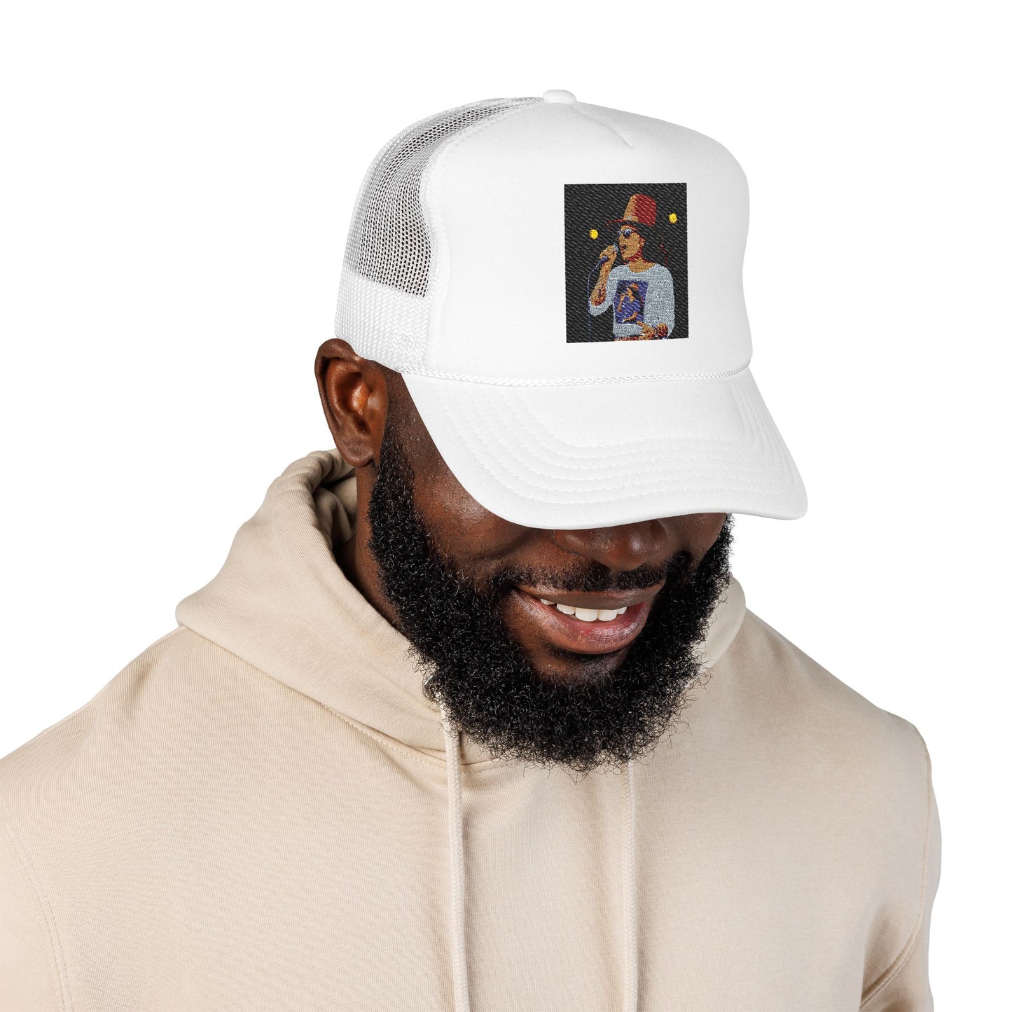 Man wearing a white trucker hat with a graphic design on a white background