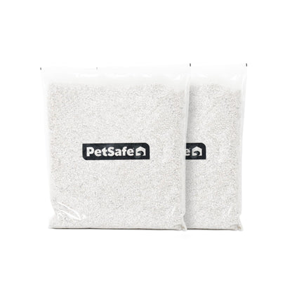 Two transparent bags of PetSafe ScoopFree Crystal Cat Litter Refills - Fresh Scent (2-Pack), silica crystals.