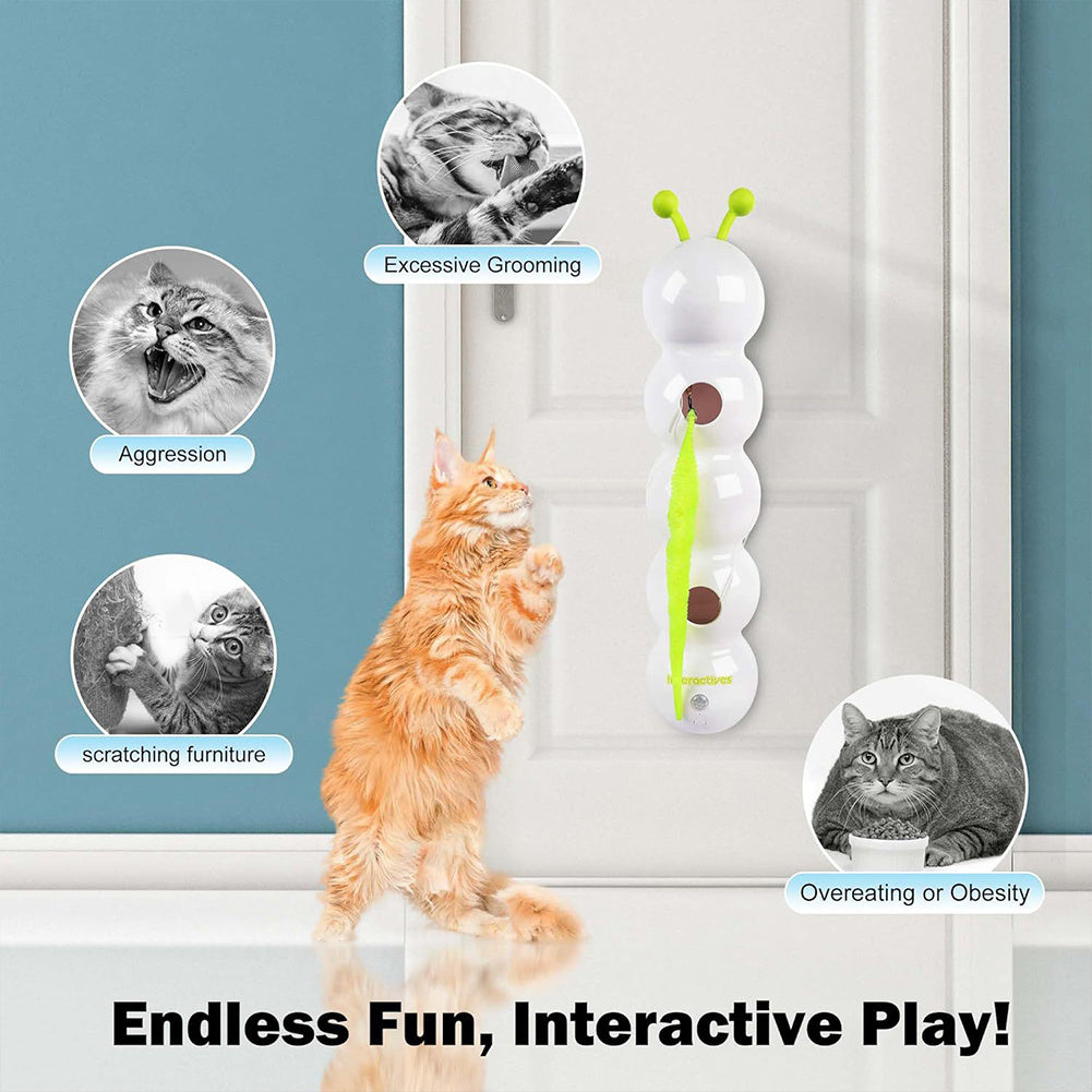 Interactive cat toy with motion sensor suctioned to glass, entertaining indoor cat